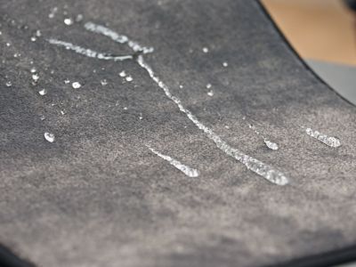 Was ist der zusätzliche Fleckenschutz?